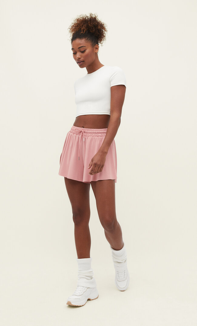 

Stradivarius Fließende Sportshorts Puderrosa M