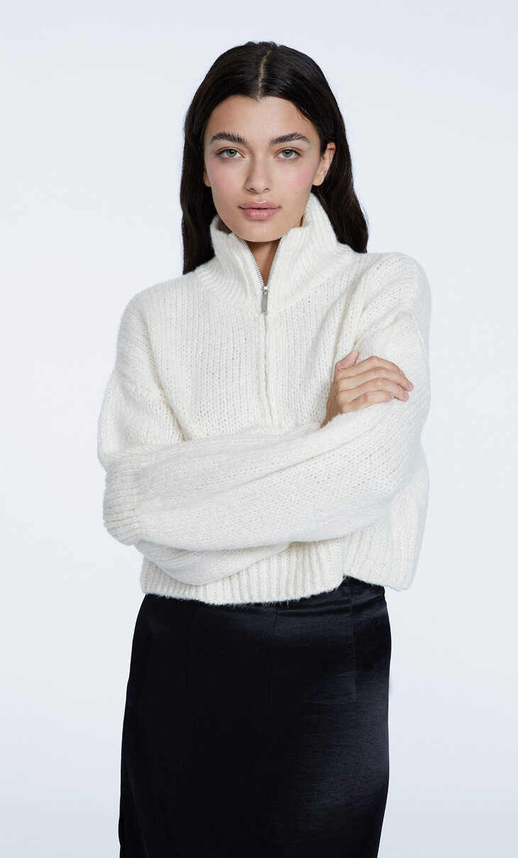 Knit sweater with a felted zip