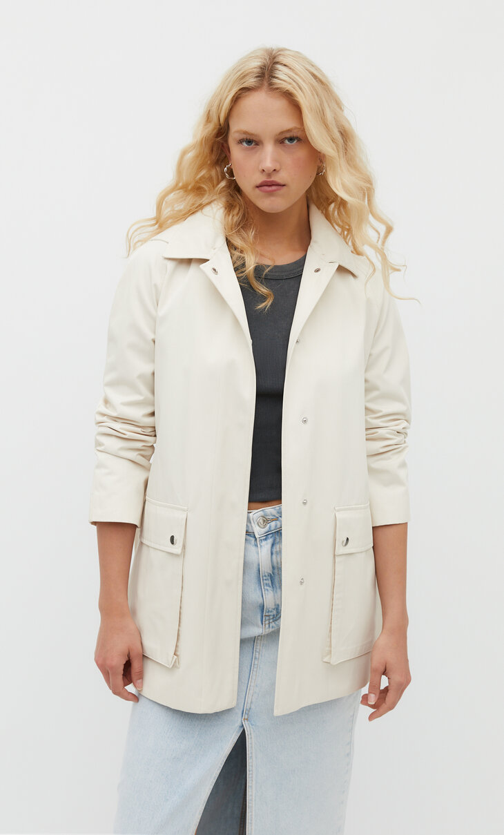 Short technical trench coat with hood