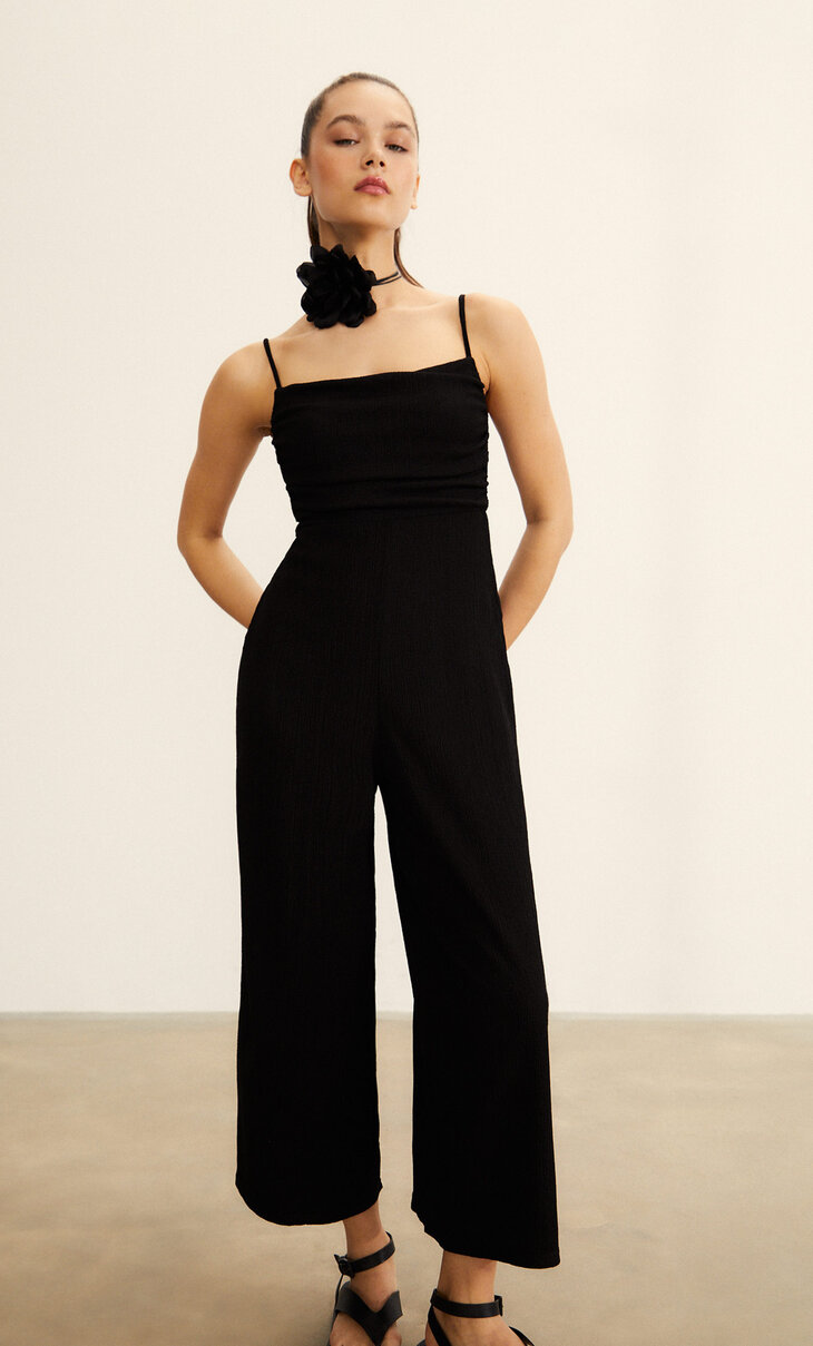 Cropped knit jumpsuit with draped neckline