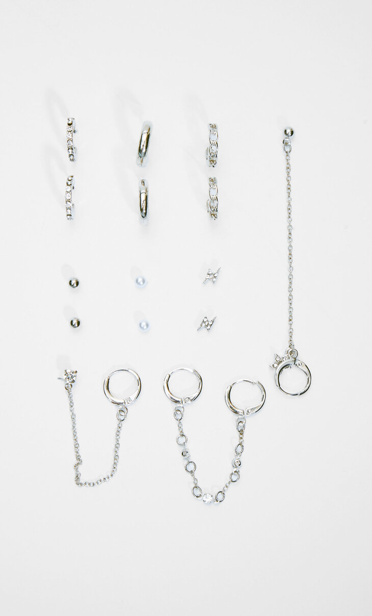 9 žiedinių ir grandinėle puoštų auskarų porų rinkinys su dirbtiniais brangakmeniais.