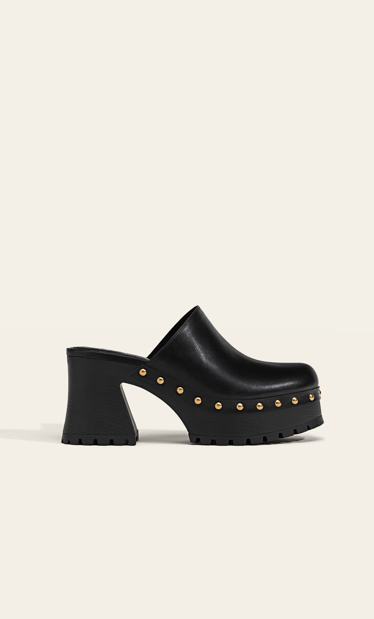 Heeled clogs with studs