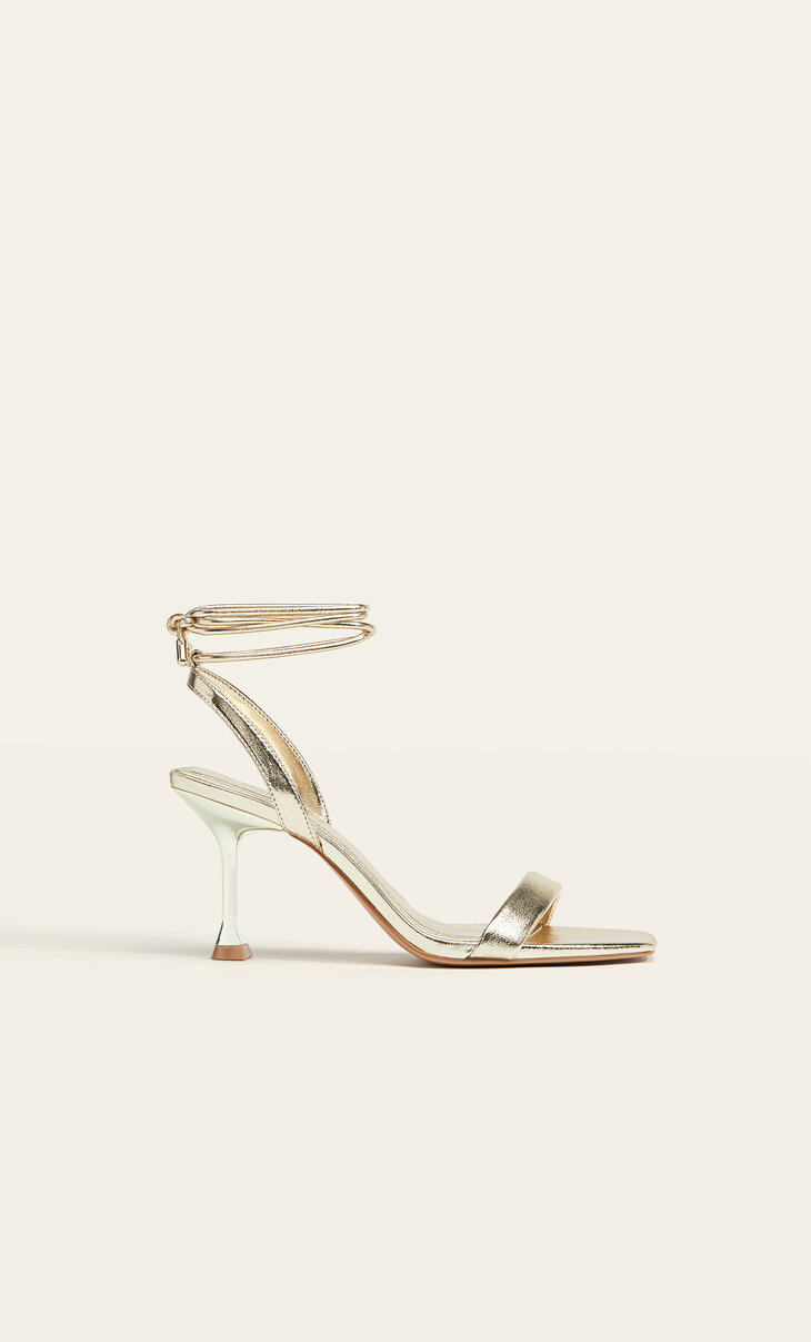 Tied gold stiletto heel sandals