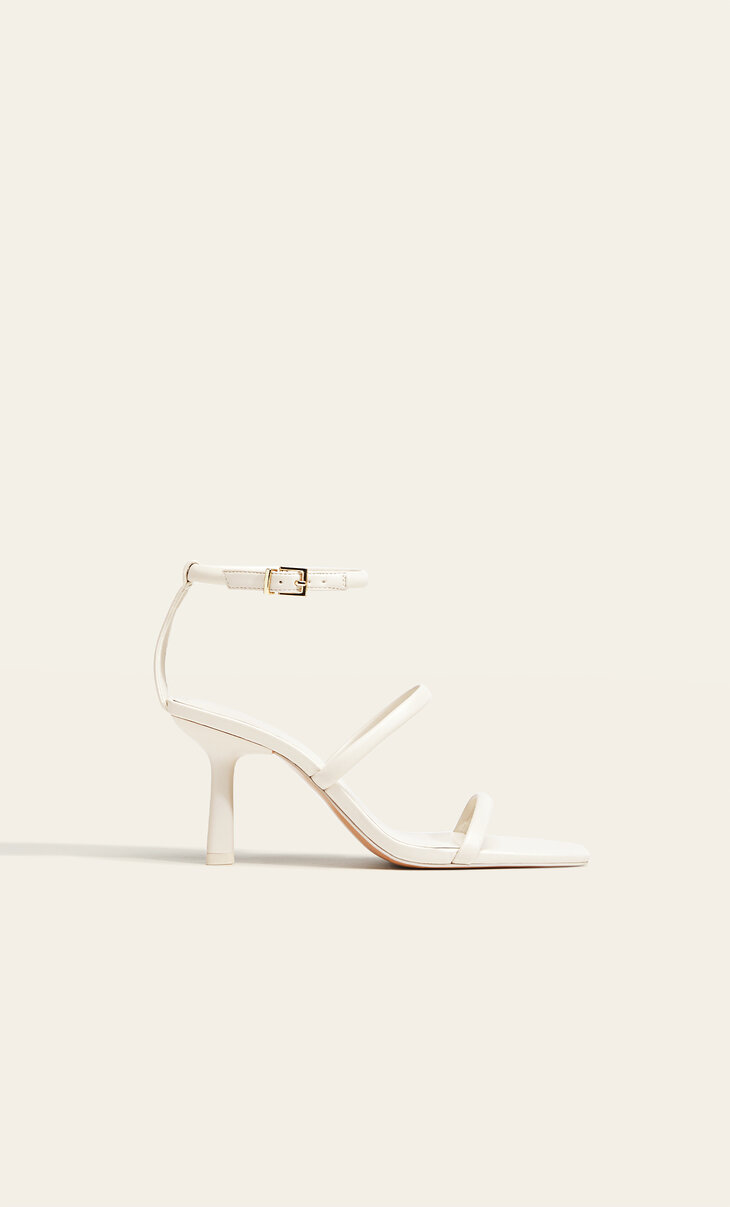 High-heel strappy sandals with buckled fastening