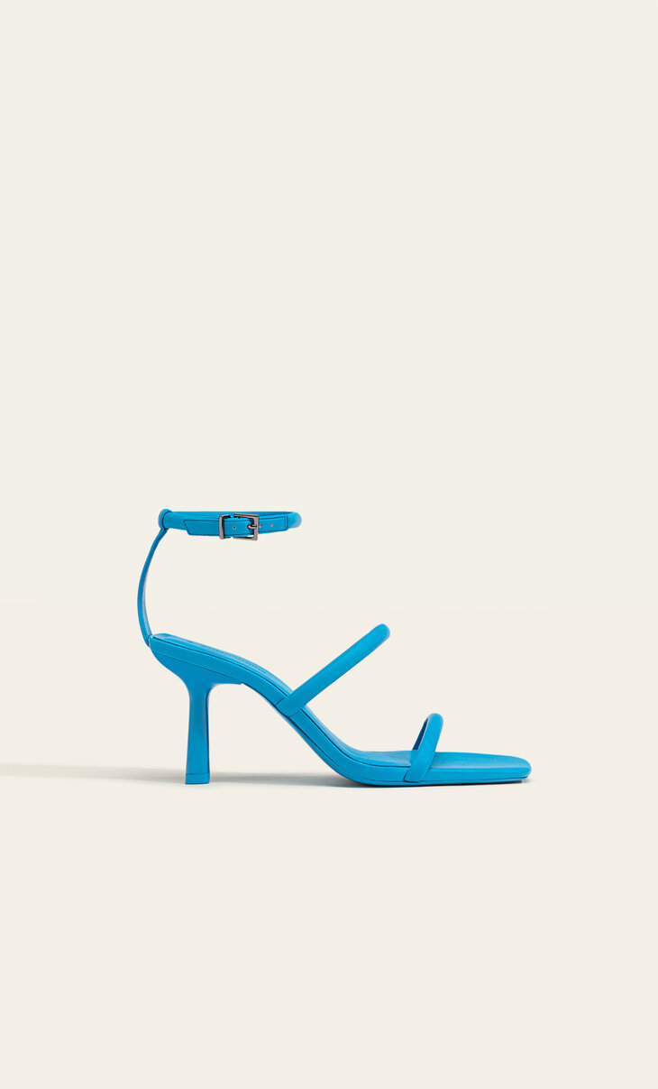 High-heel strappy sandals with buckled fastening