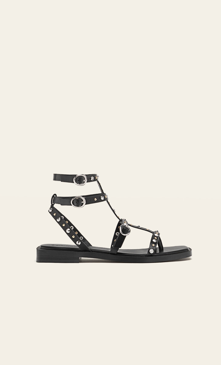 Black flat sandals with studs