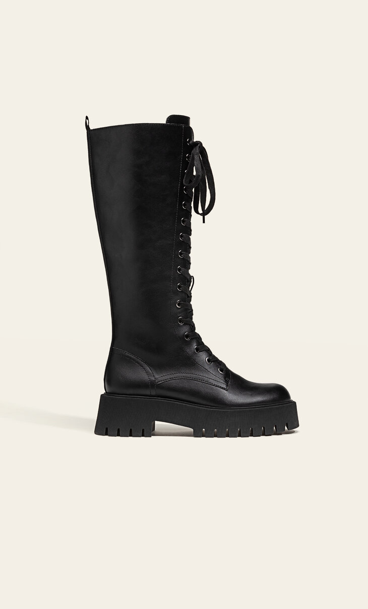 Flat track sole lace-up boots