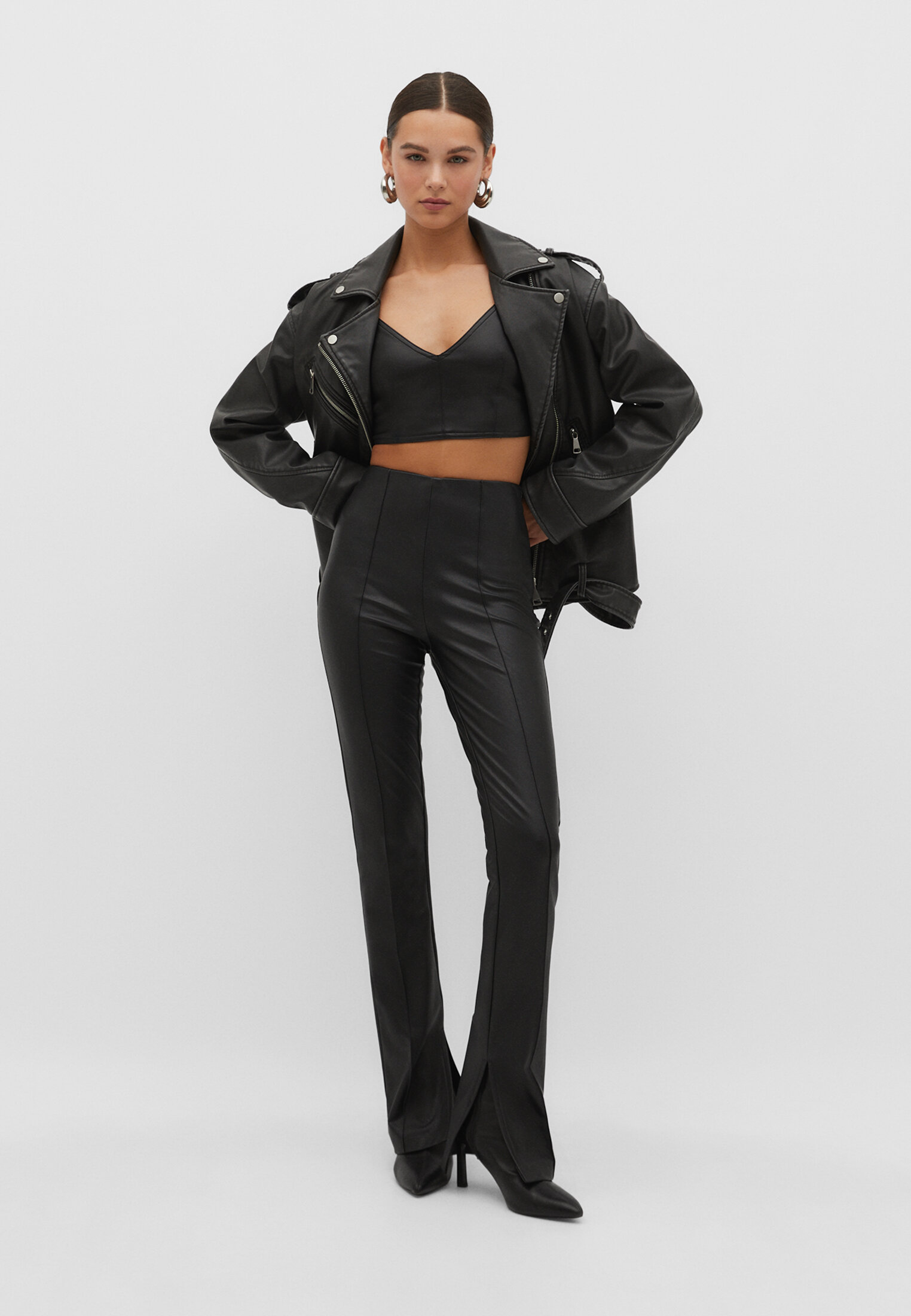 Faux leather flared split-hem trousers