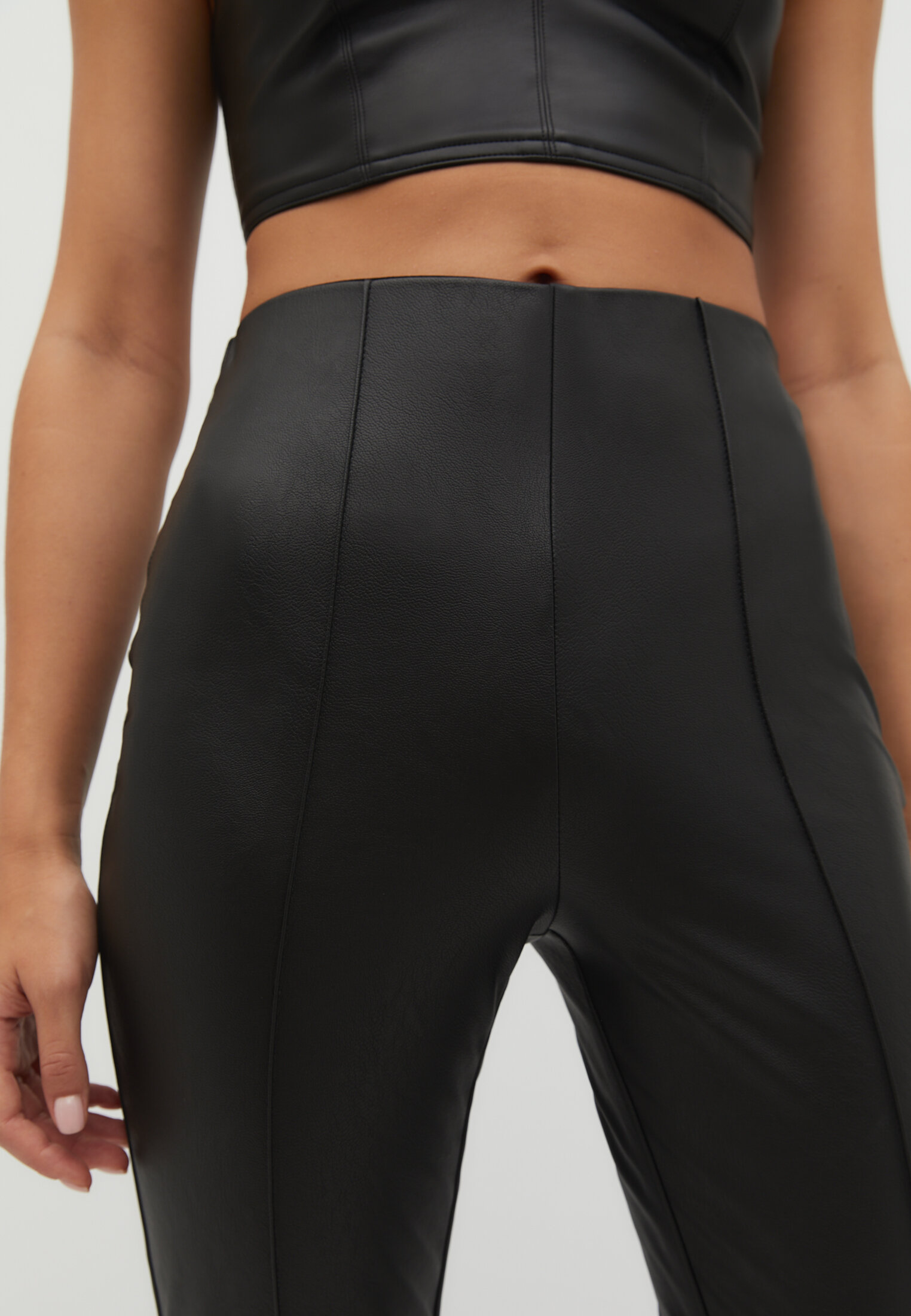 Faux leather flared split-hem trousers - Women's fashion