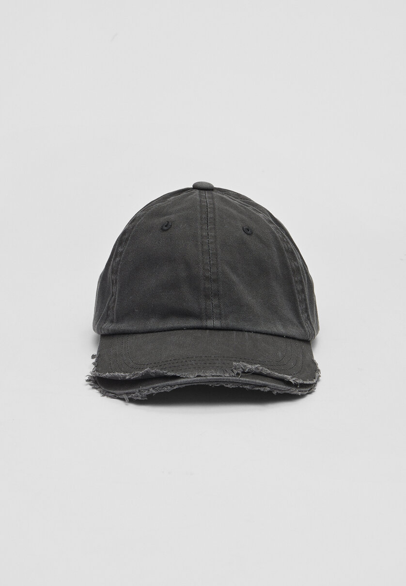 Frayed cap