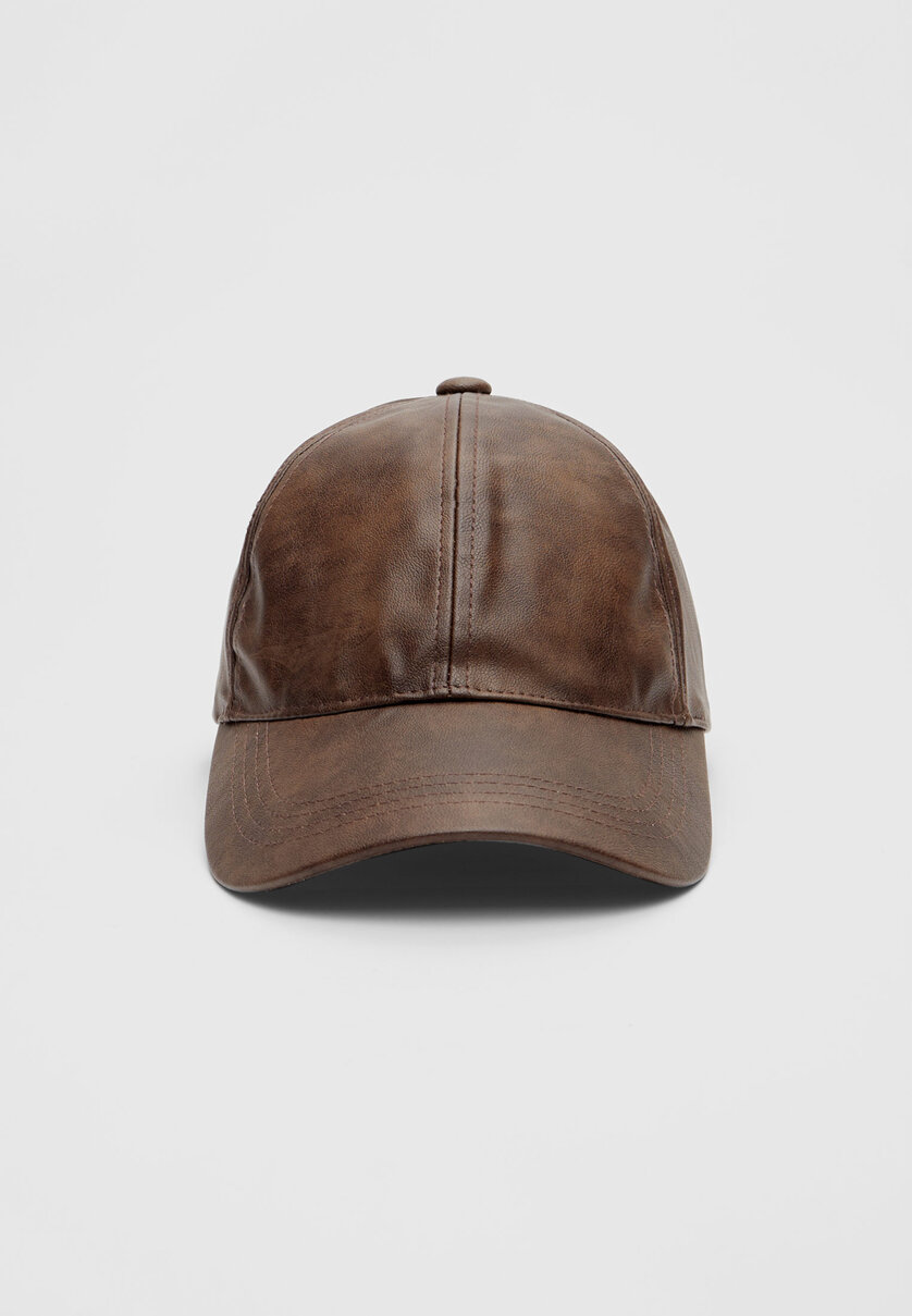 Faded leather effect cap