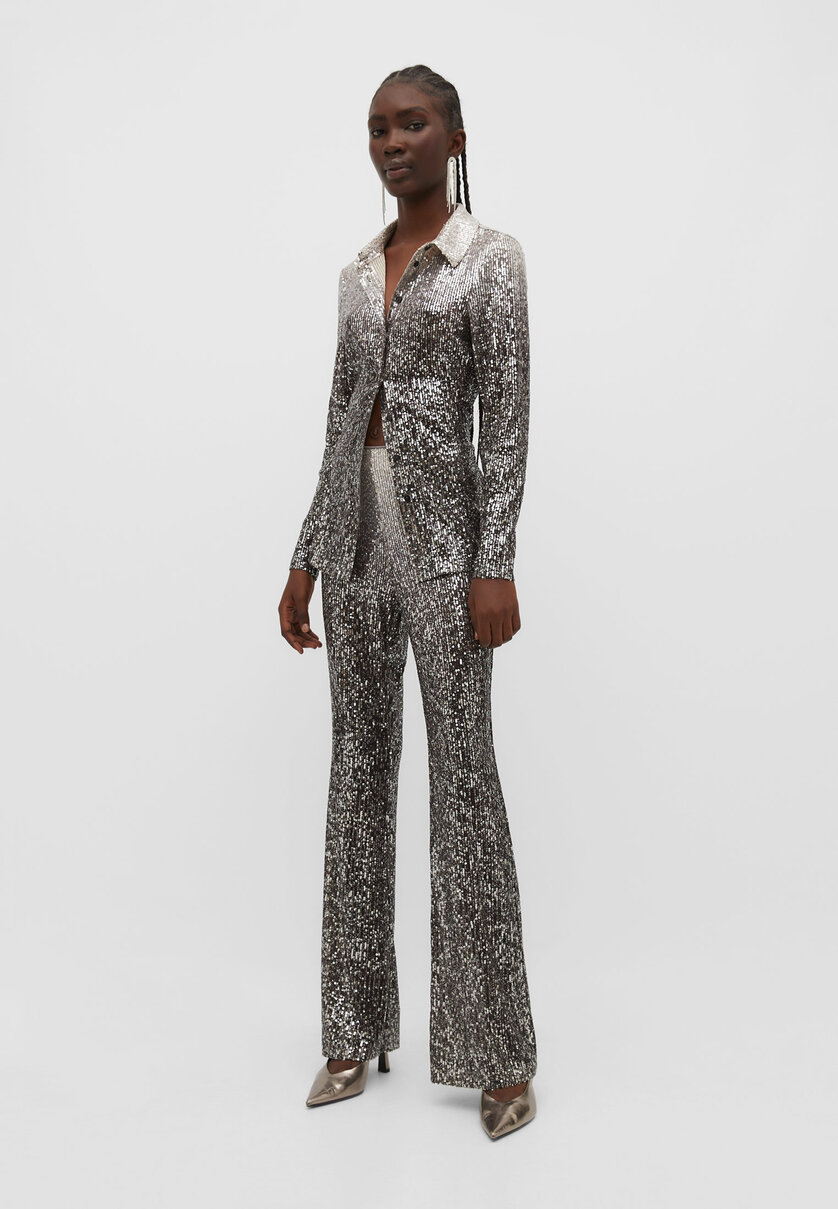Flared trousers with ombré sequins