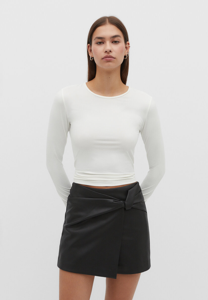 Leather effect skort with side bow