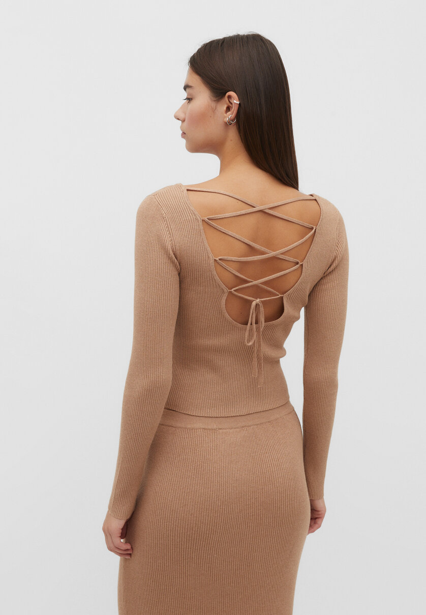 Knit jumper with a laced-up back