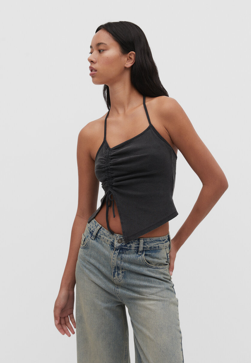 Asymmetric halter neck top with gathered sides