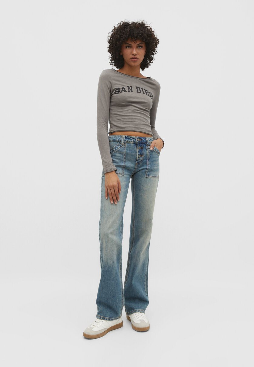 Jeans med påsydda fickor