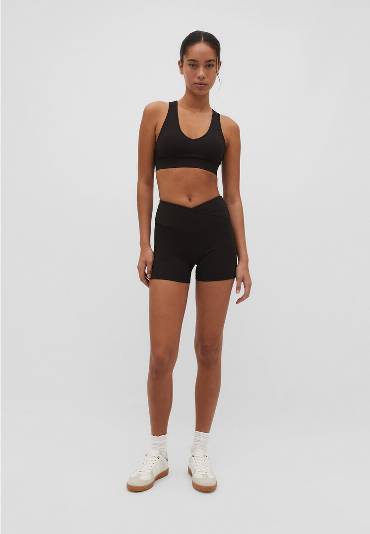 

Stradivarius Sport-Top mit V-Ausschnitt und Corsage Schwarz S