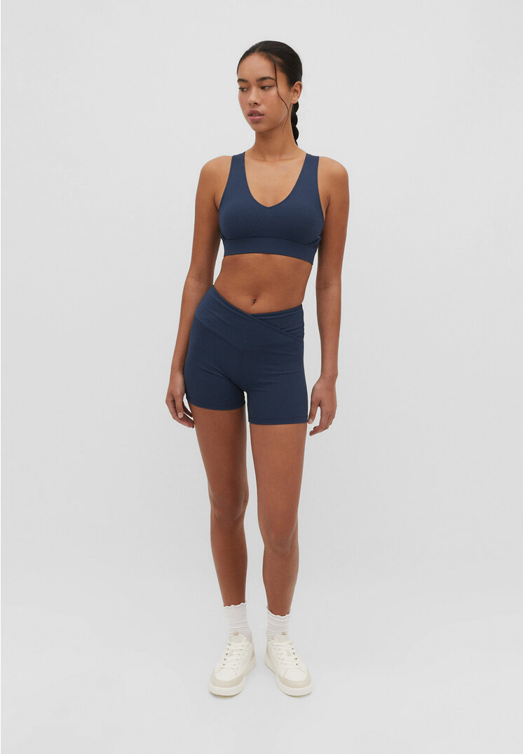 

Stradivarius Sport-Top mit V-Ausschnitt und Corsage Marineblau M