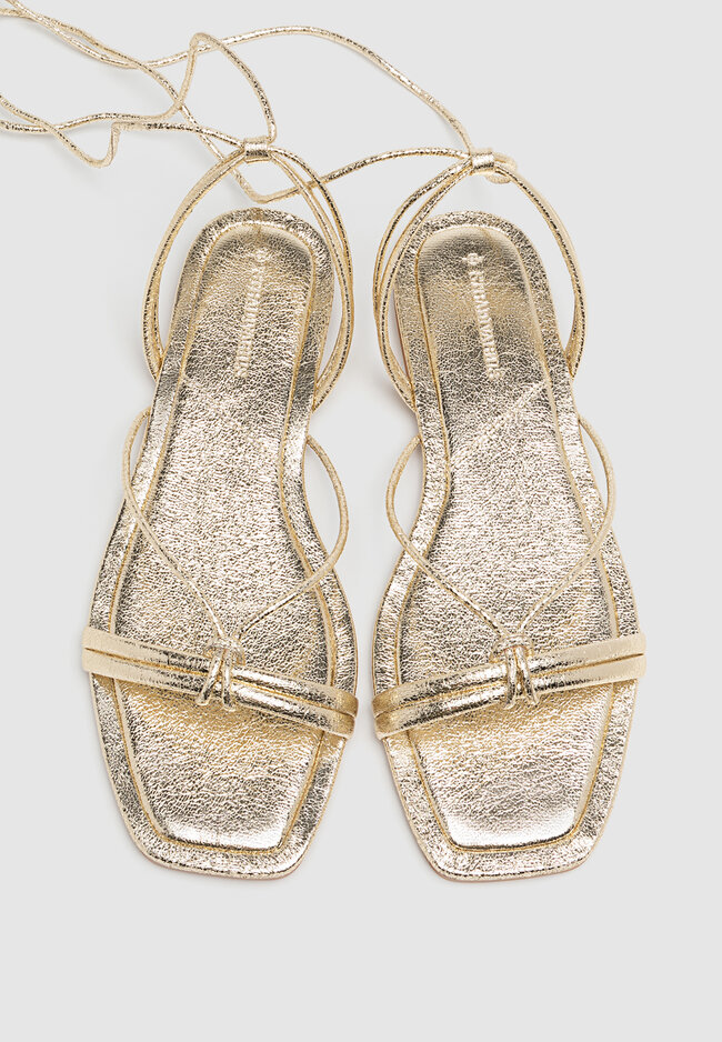 White and top gold sandals