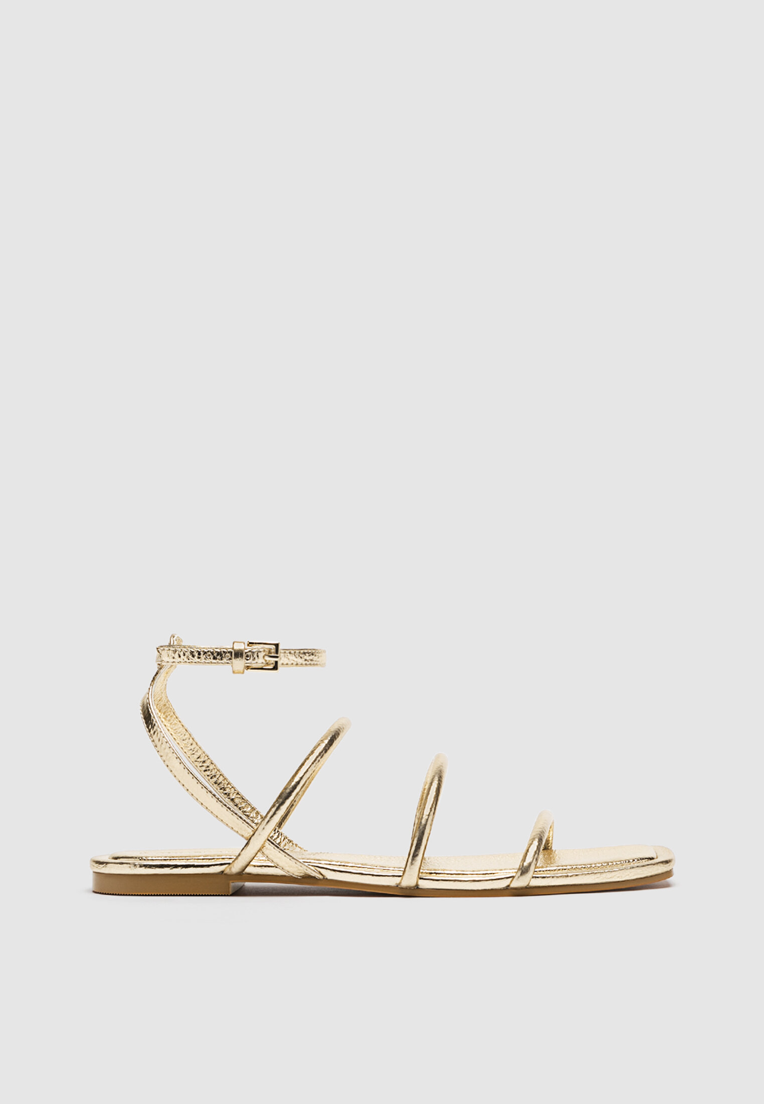 Flat sandals with tied straps