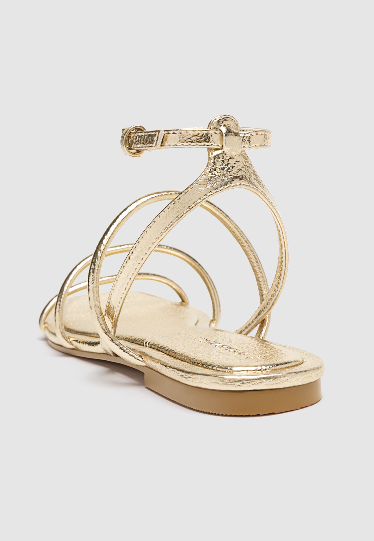 Flat sandals with tied straps
