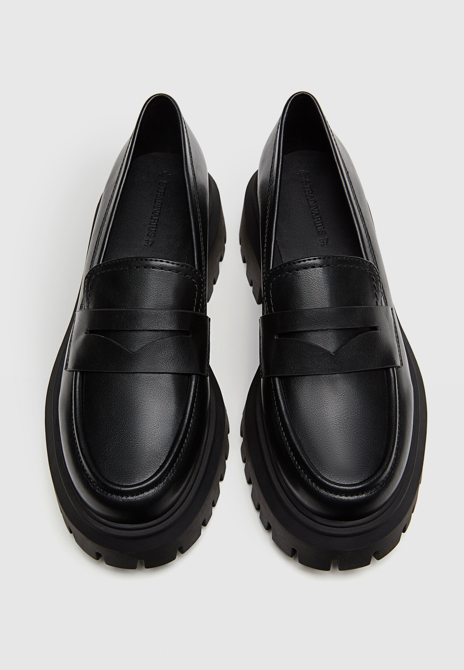 Mocasin store suela track