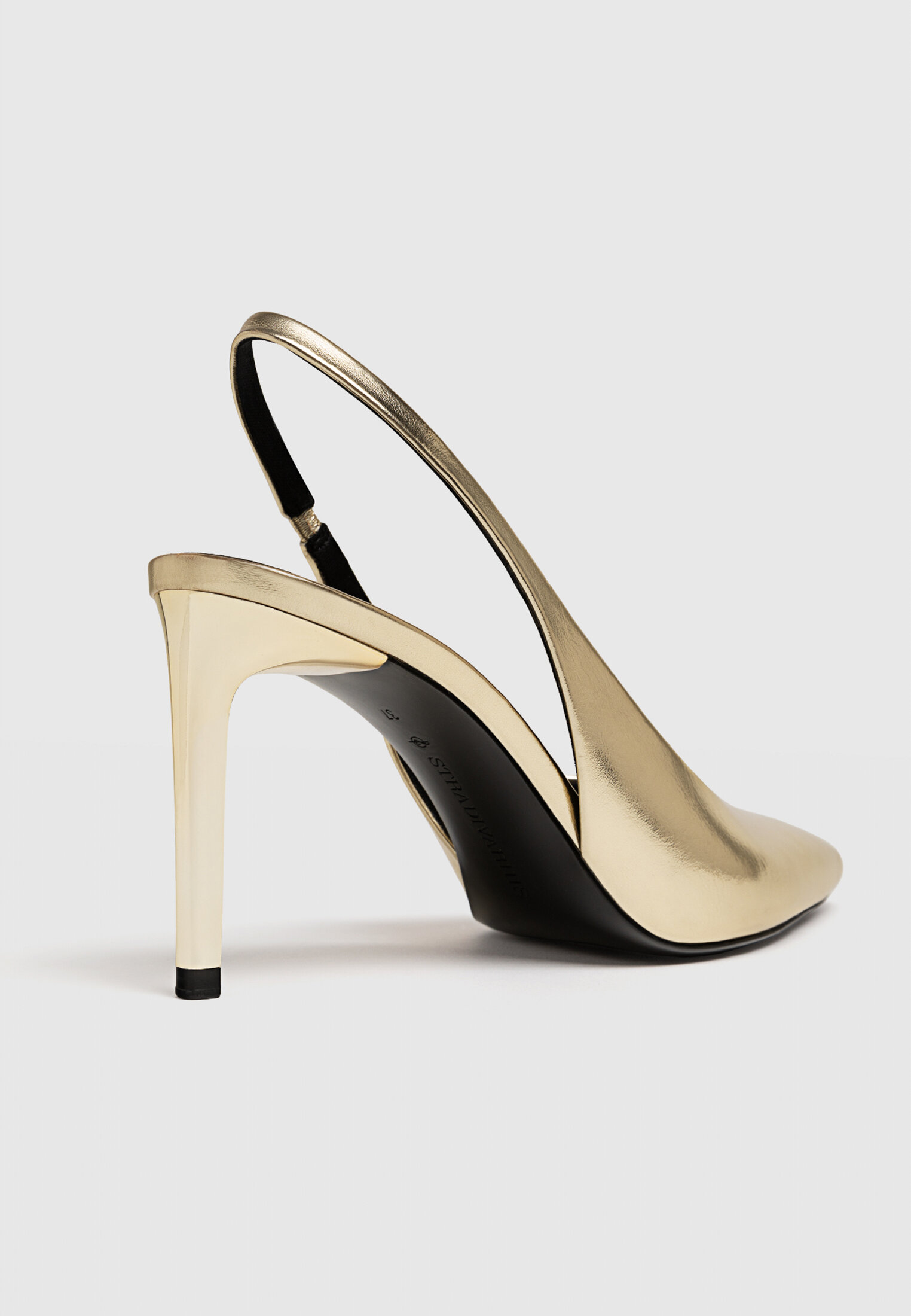 Scarpe dorate con tacco slingback
