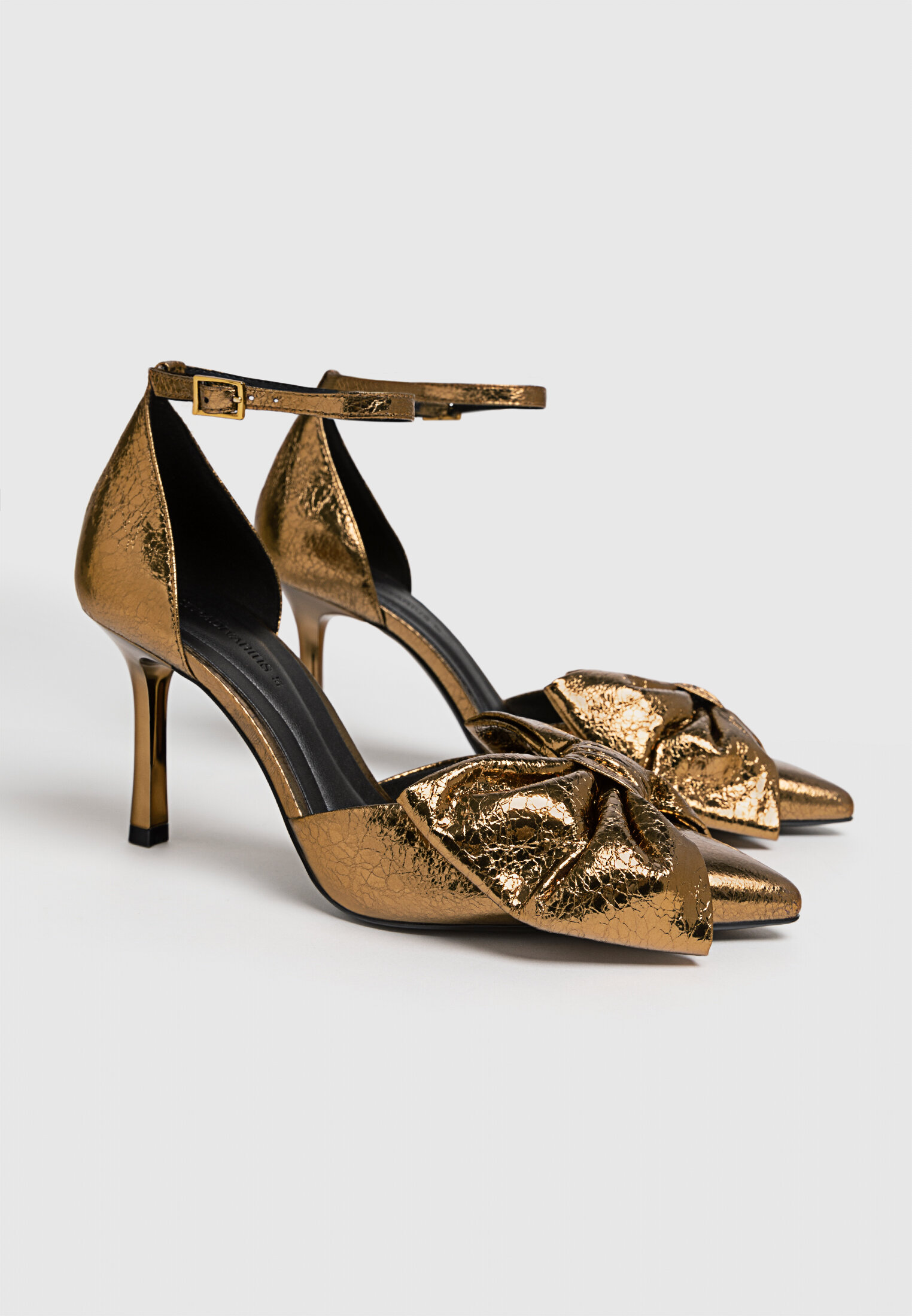 Zapatos dorados stradivarius discount
