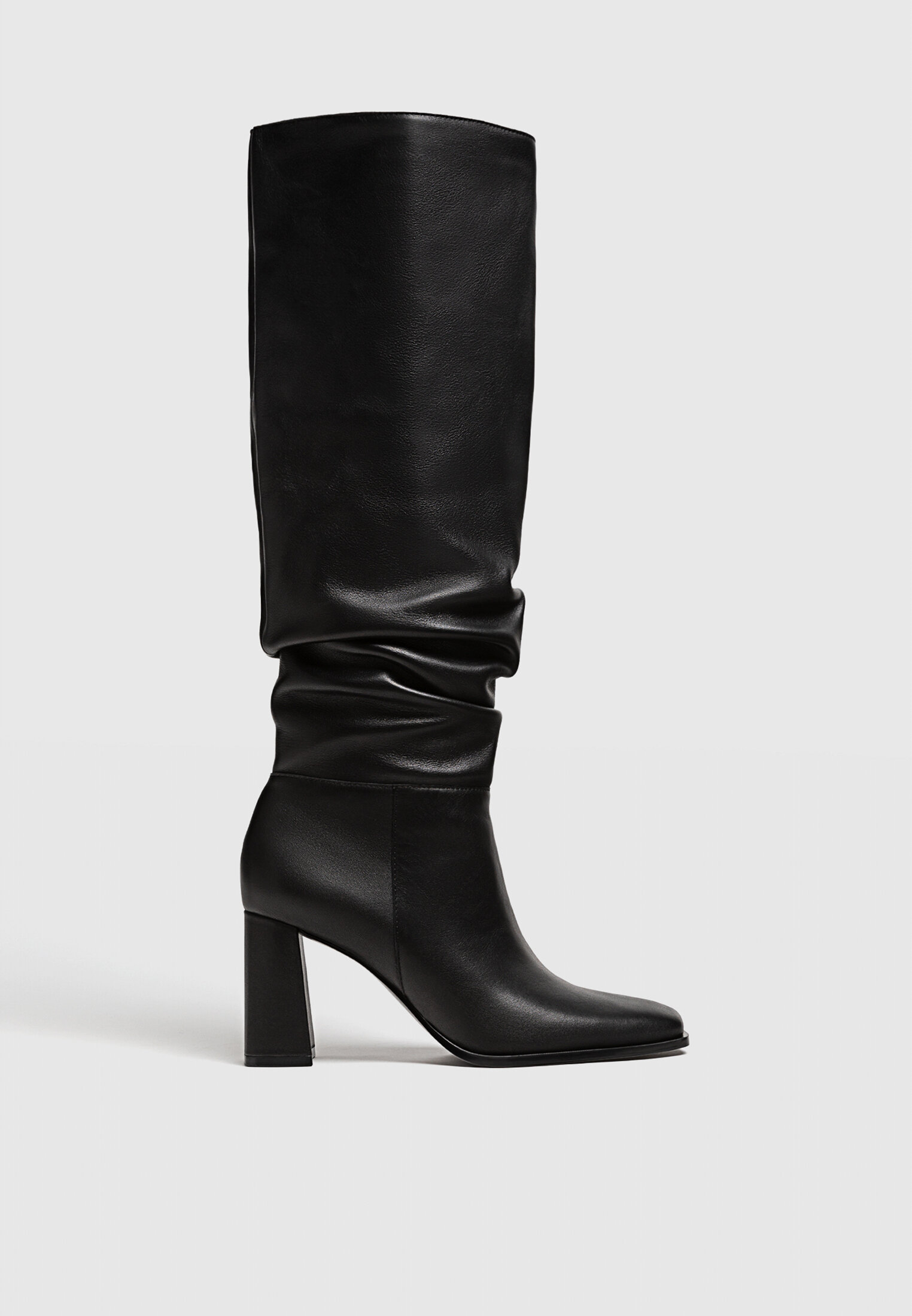 Slouchy leather high heel boots