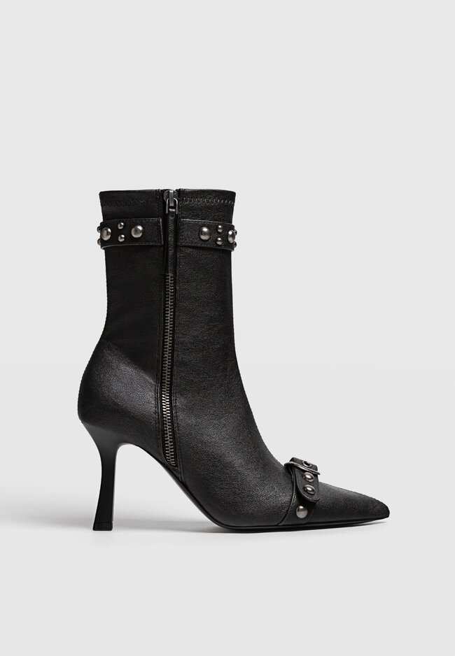 Distressed studded ankle boots with buckles