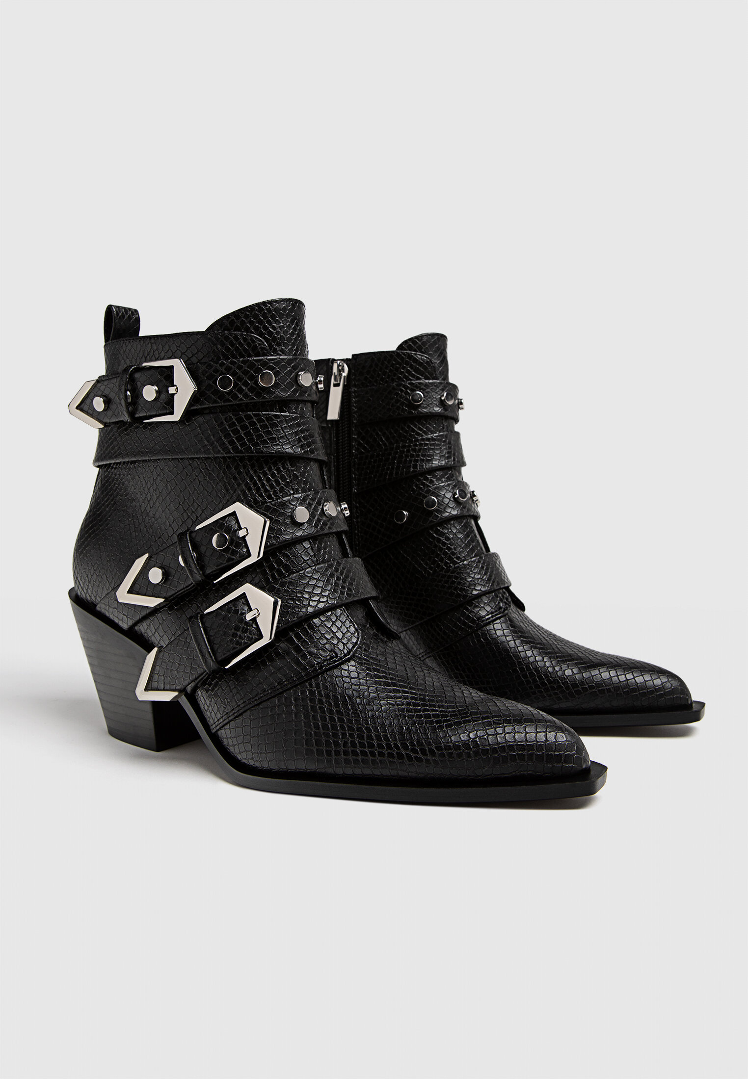 Black high heel ankle boots with buckles