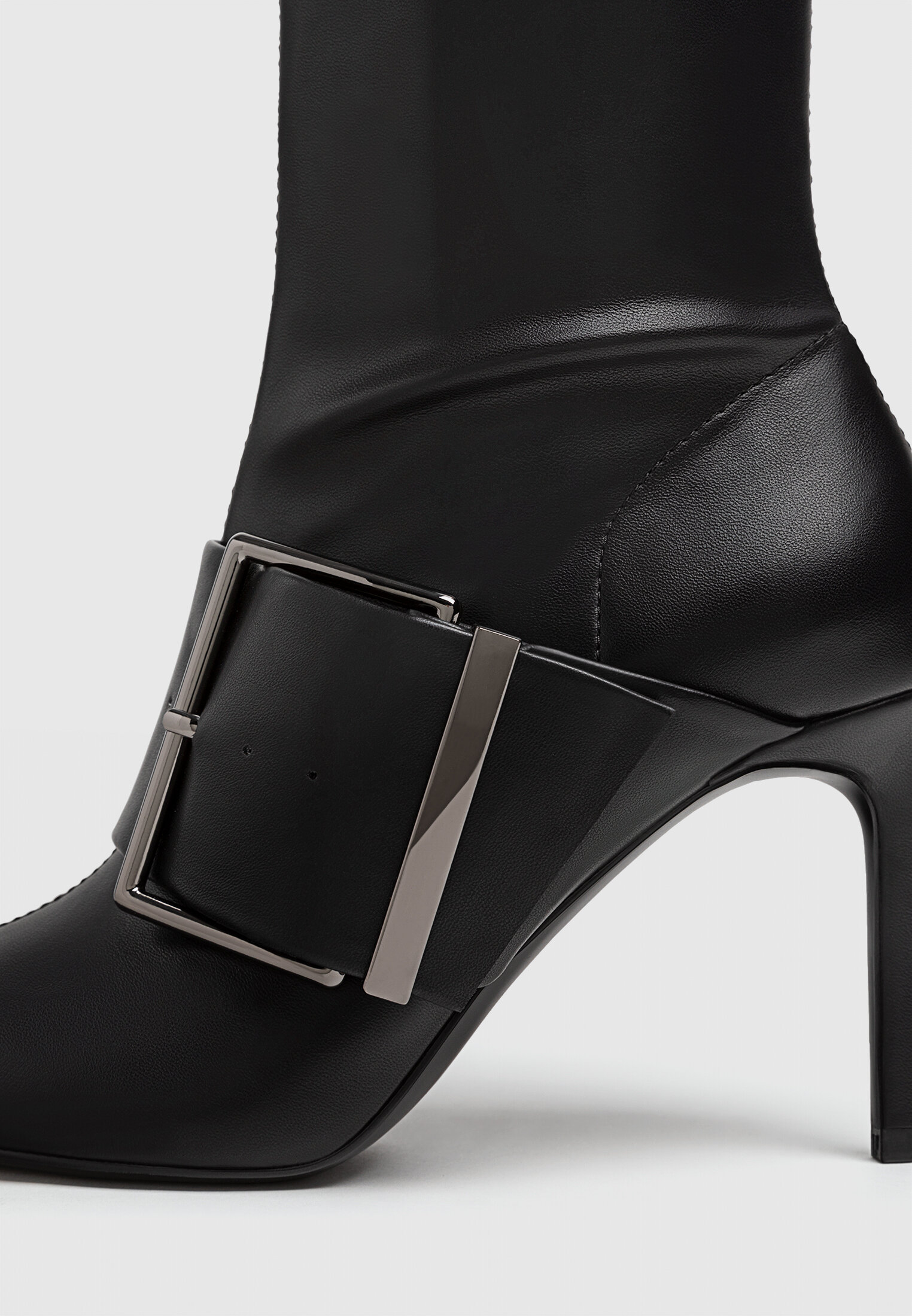 Black maxi high heel ankle boots with buckles