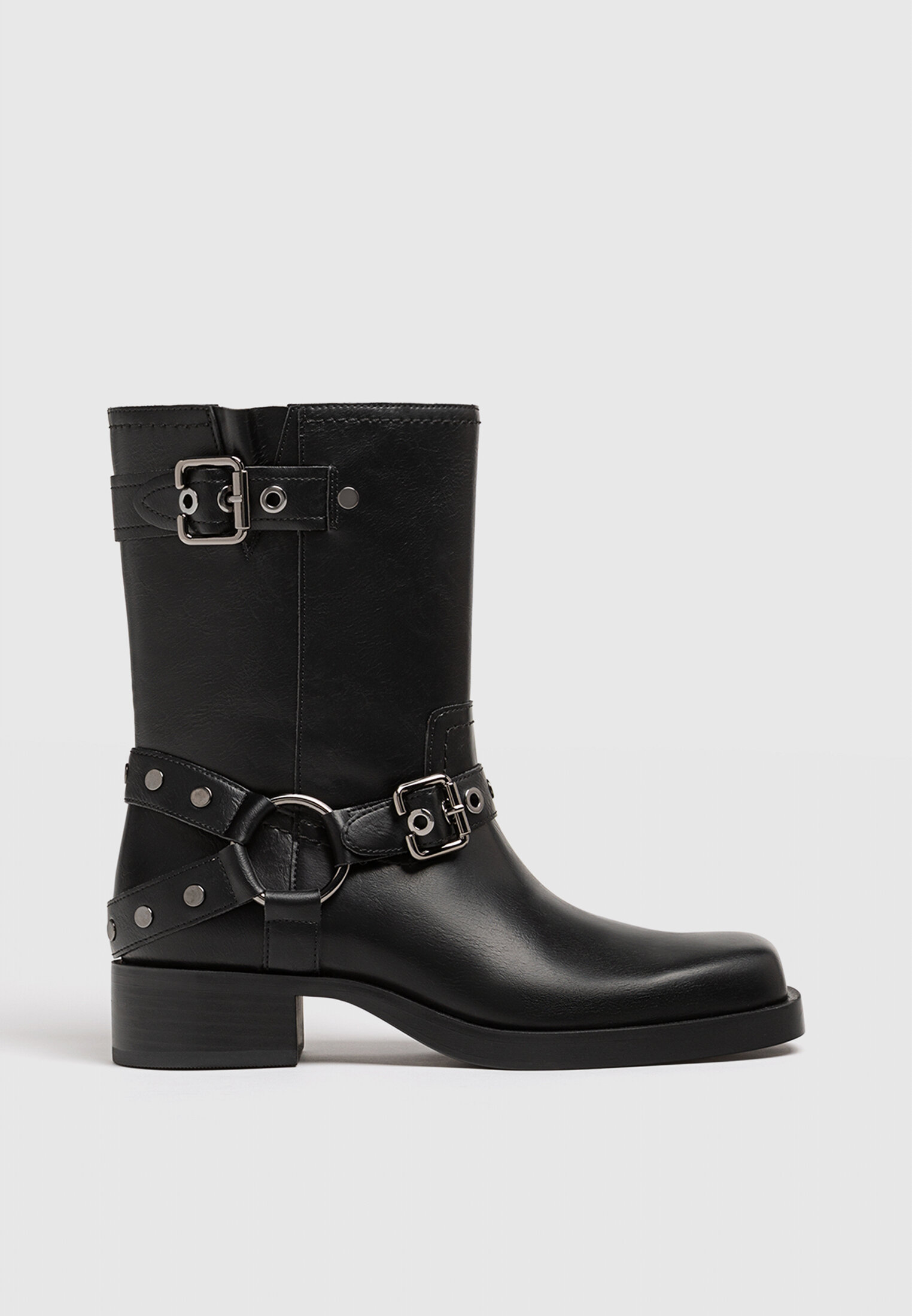 Flat biker ankle boots with buckle details