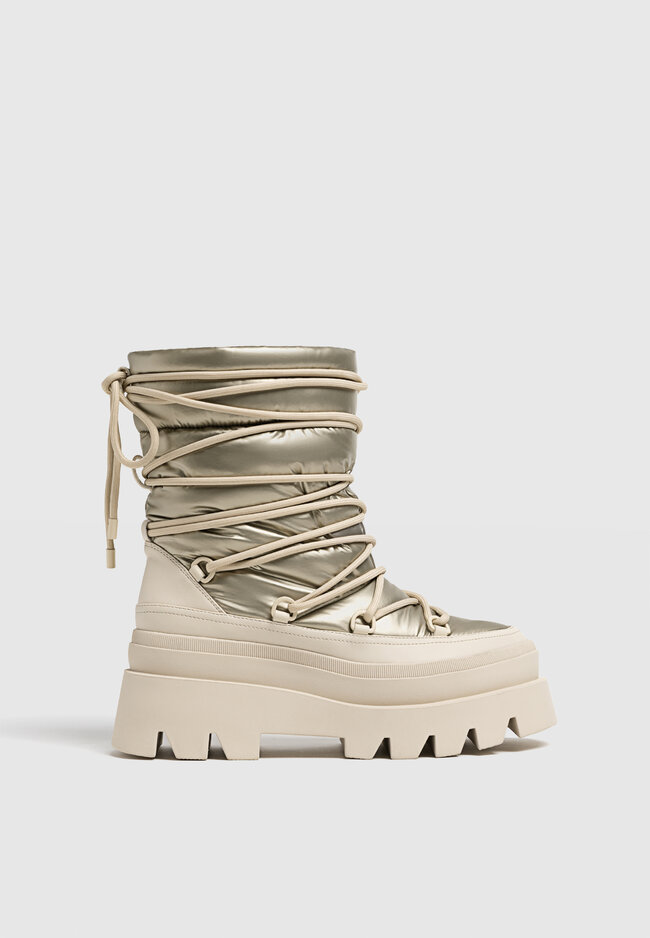 Stradivarius Flache Stiefeletten mit Steppmuster GOLD 37