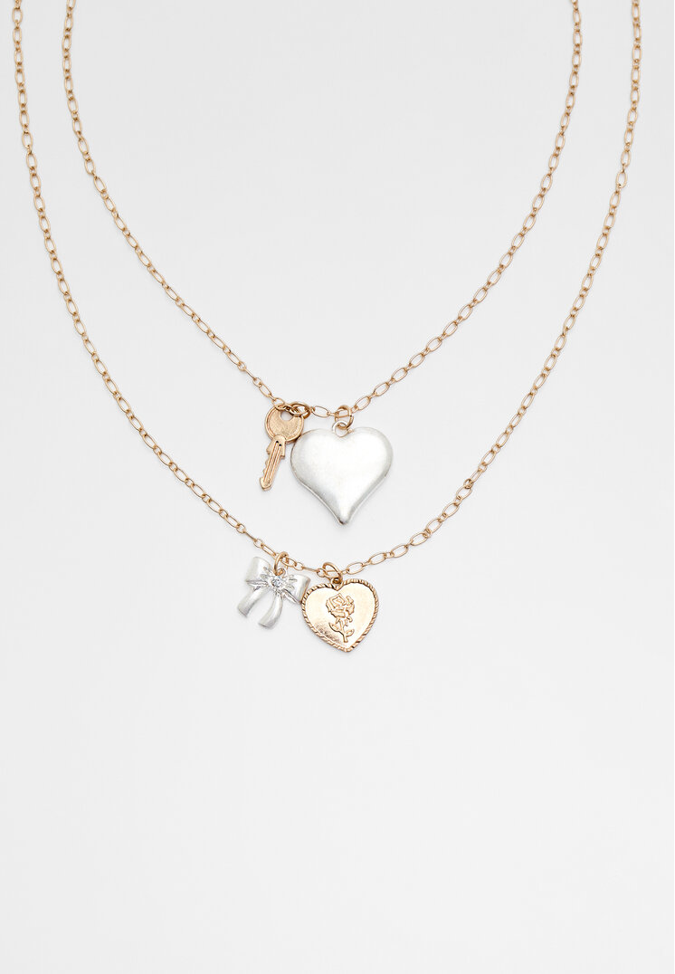 

Stradivarius 2er-Set Halsketten mit Herz und Schleife Goldfarben OS