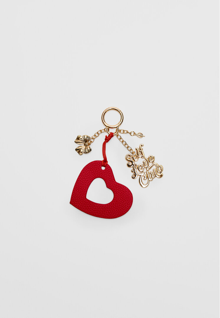 

Stradivarius Schlüsselanhänger mit Herz und Charm Rot OS