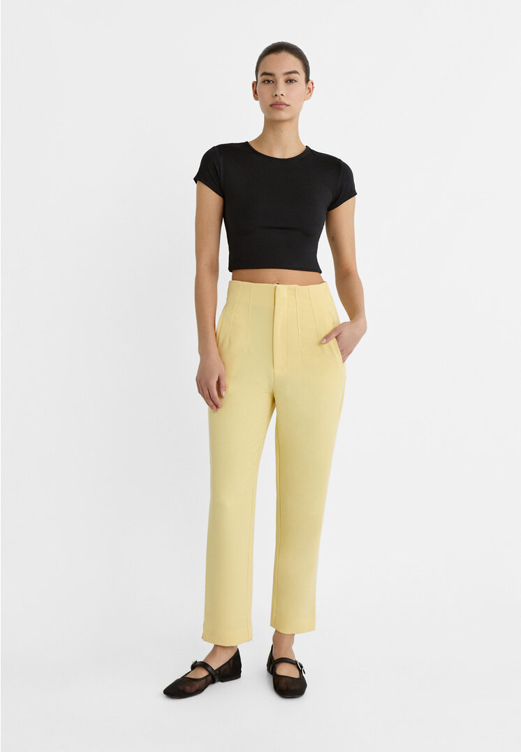 

Stradivarius Stoff-Bundfaltenhose Pastellgelb 42