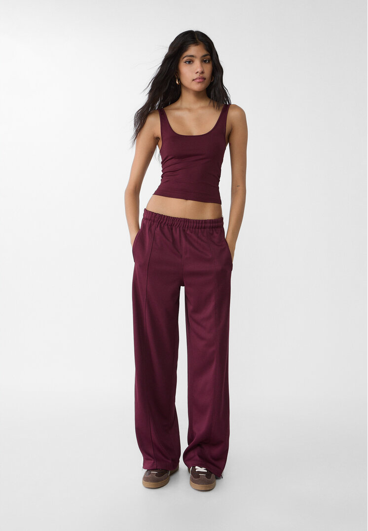 Stradivarius Lange Hose Interlock mit seitlichem Streifen Granatrot L