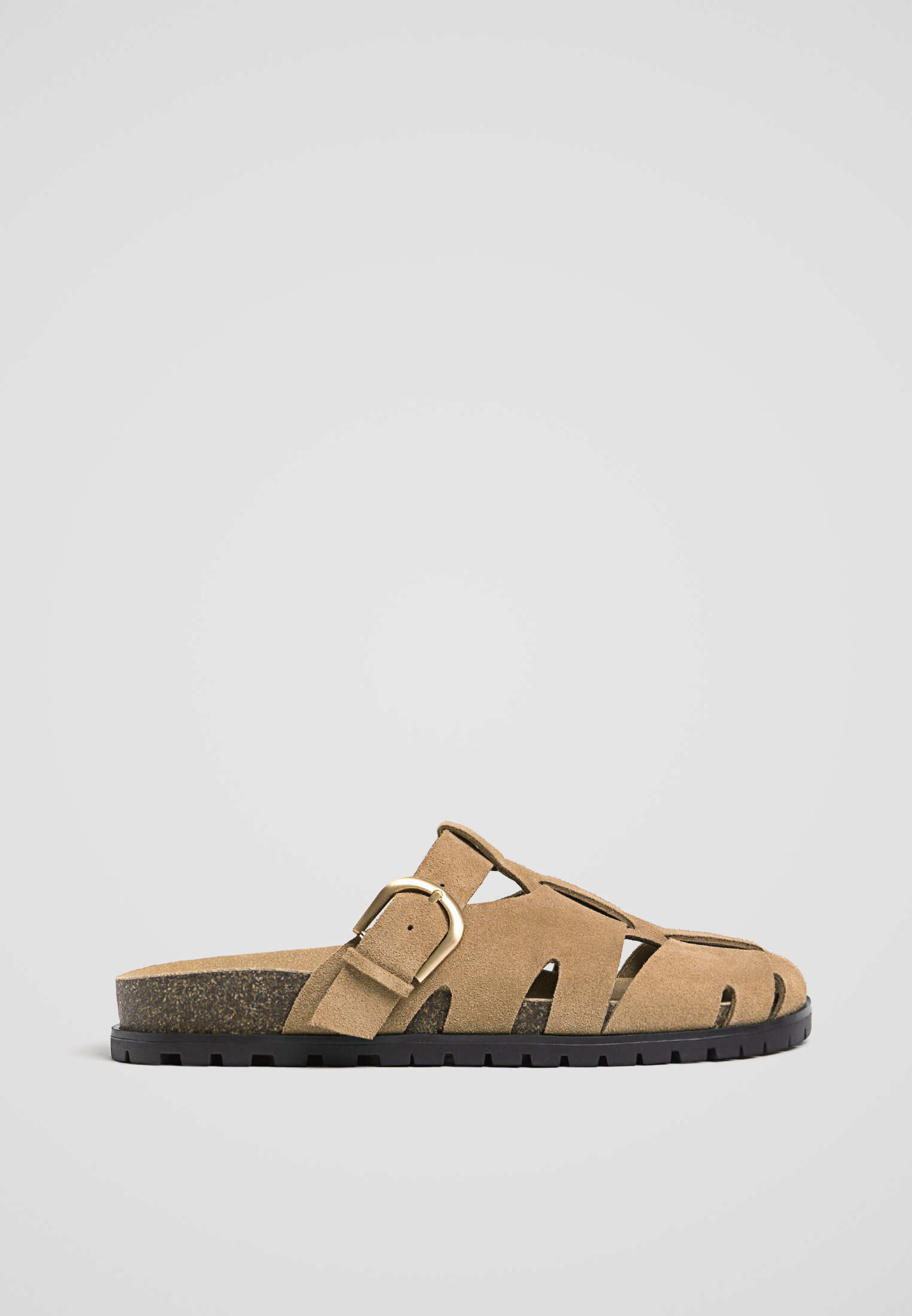 Mules tressees en daim
