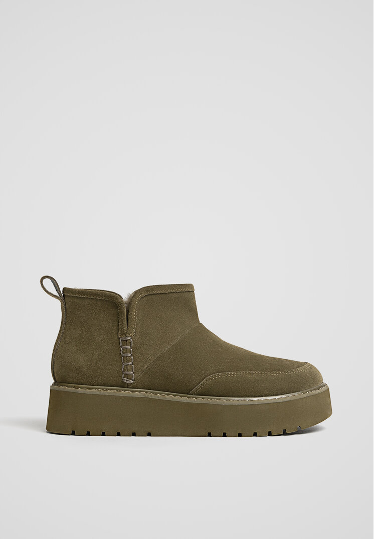 

Stradivarius Skórzane botki ze sztucznym futerkiem Khaki 40