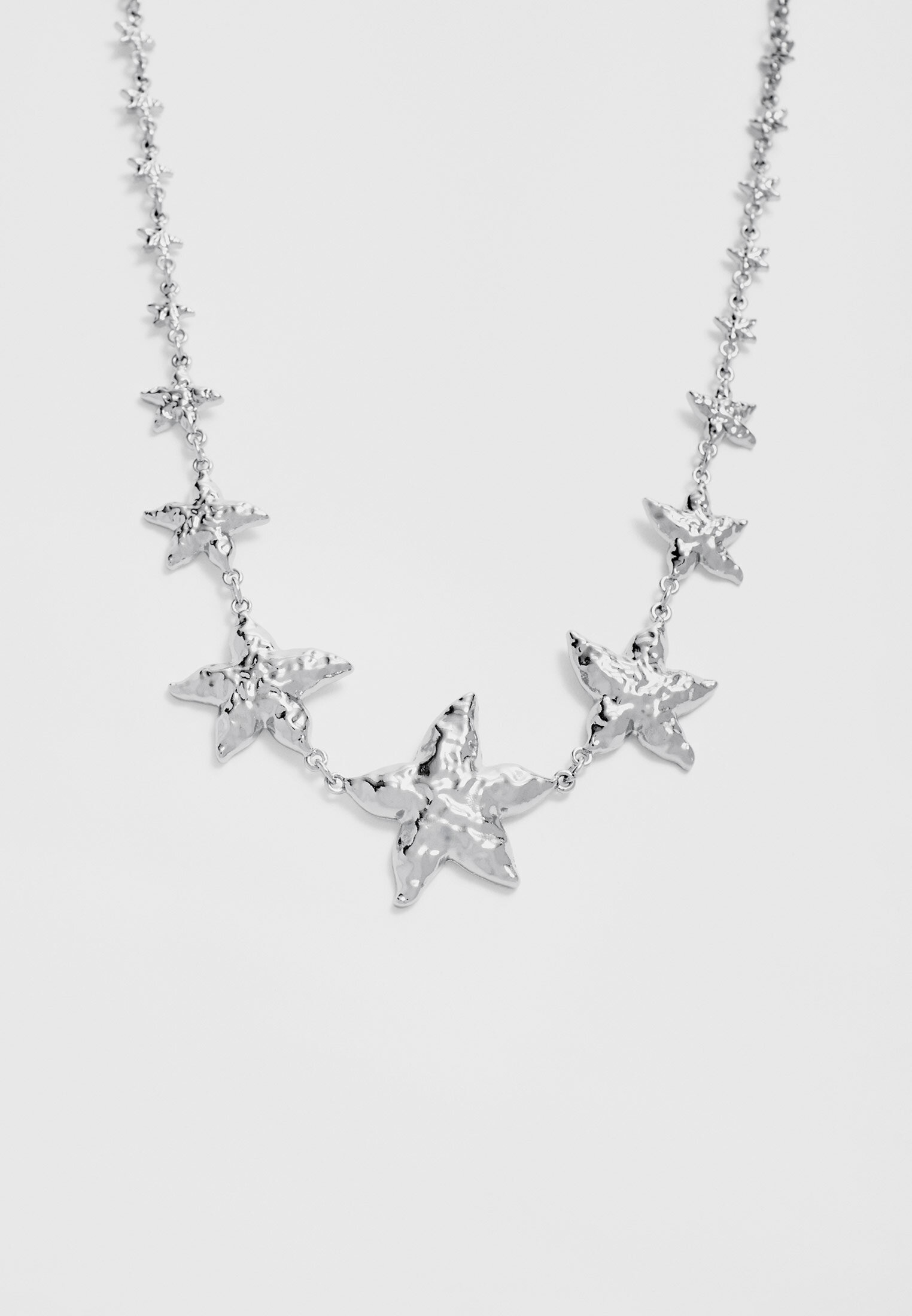 Textured star necklace - Women's fashion | Stradivarius United States