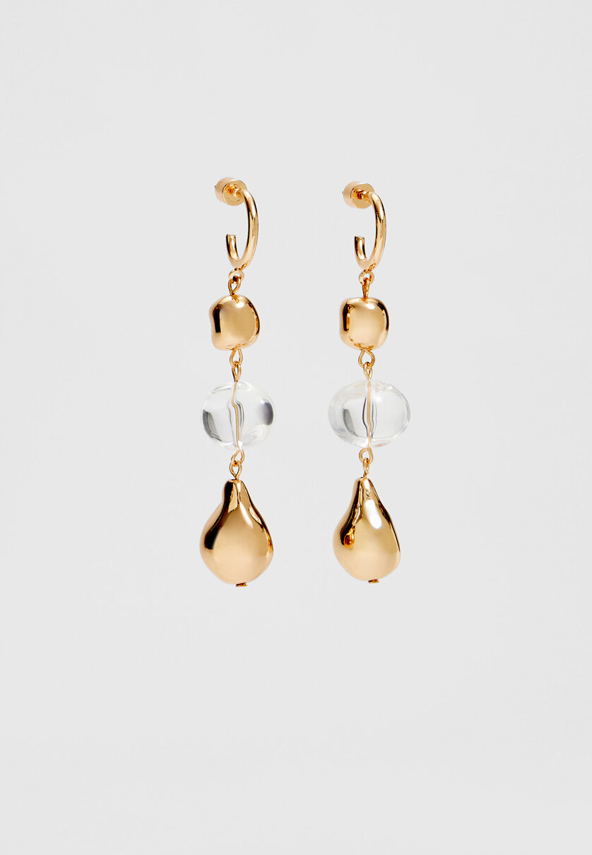Long transparent earrings with spheres