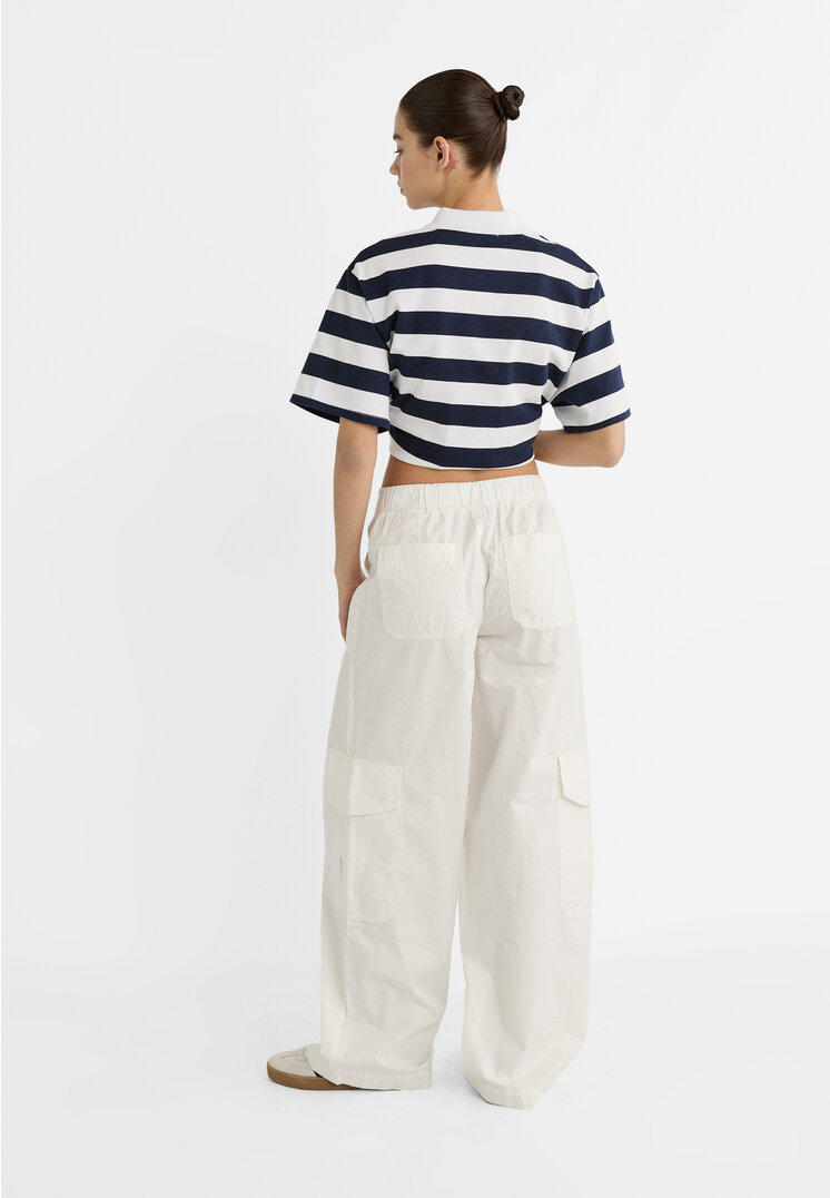 Stradivarius Pantaloni wide leg cargo multitasche Ecru 42