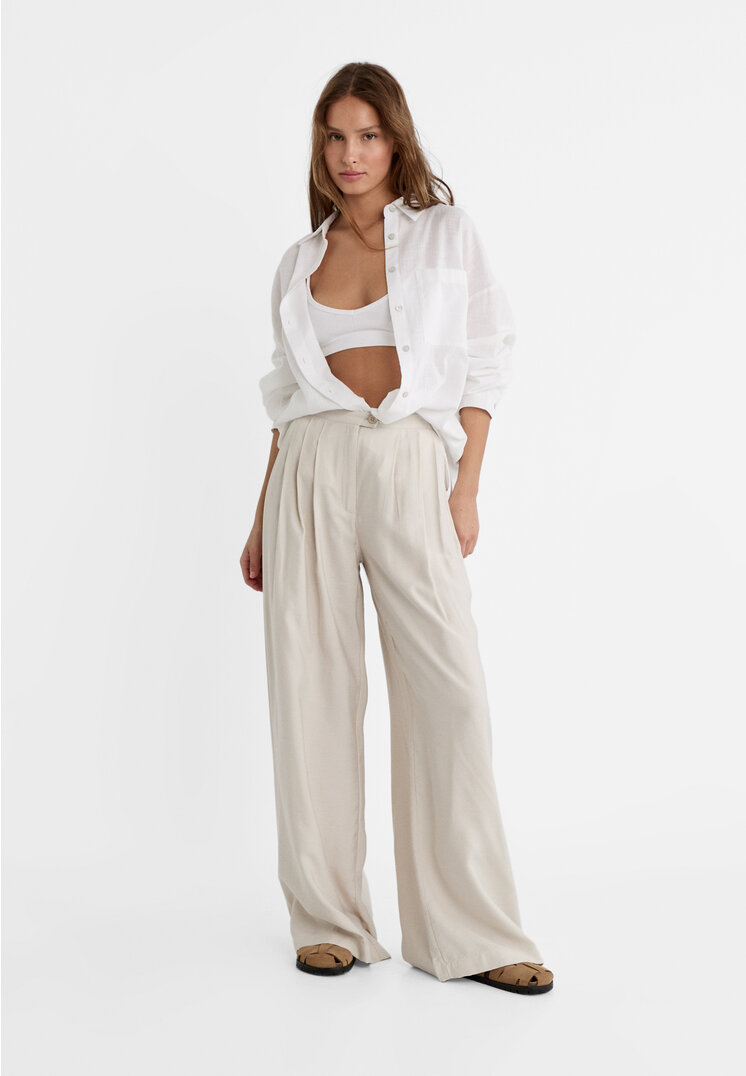 

Stradivarius Palazzo-Hose fließend Textur Beige 40