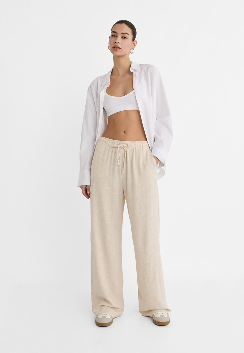 Loose-fitting linen blend trousers