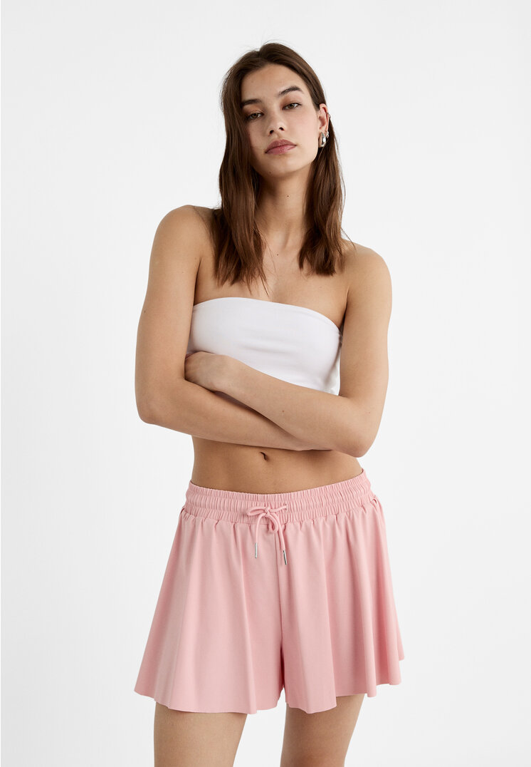 Stradivarius Fließende Sportshorts Pastellrosa L