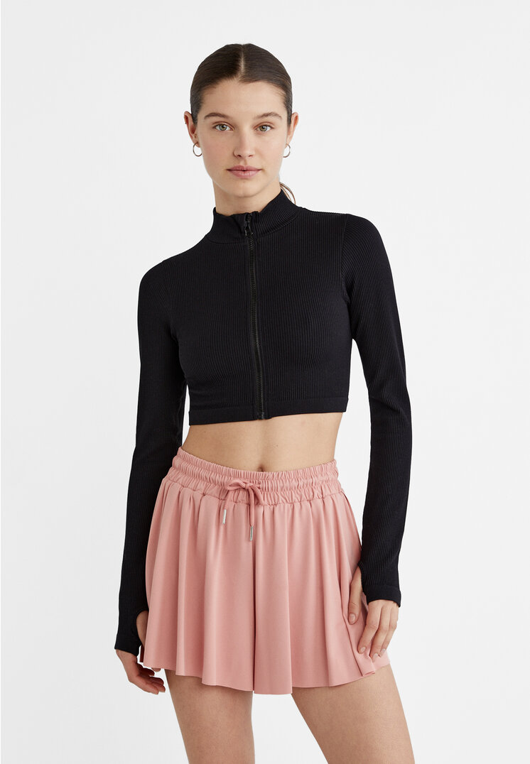 

Stradivarius Spodenki sportowe z lejącej tkaniny Pudrowy róż S
