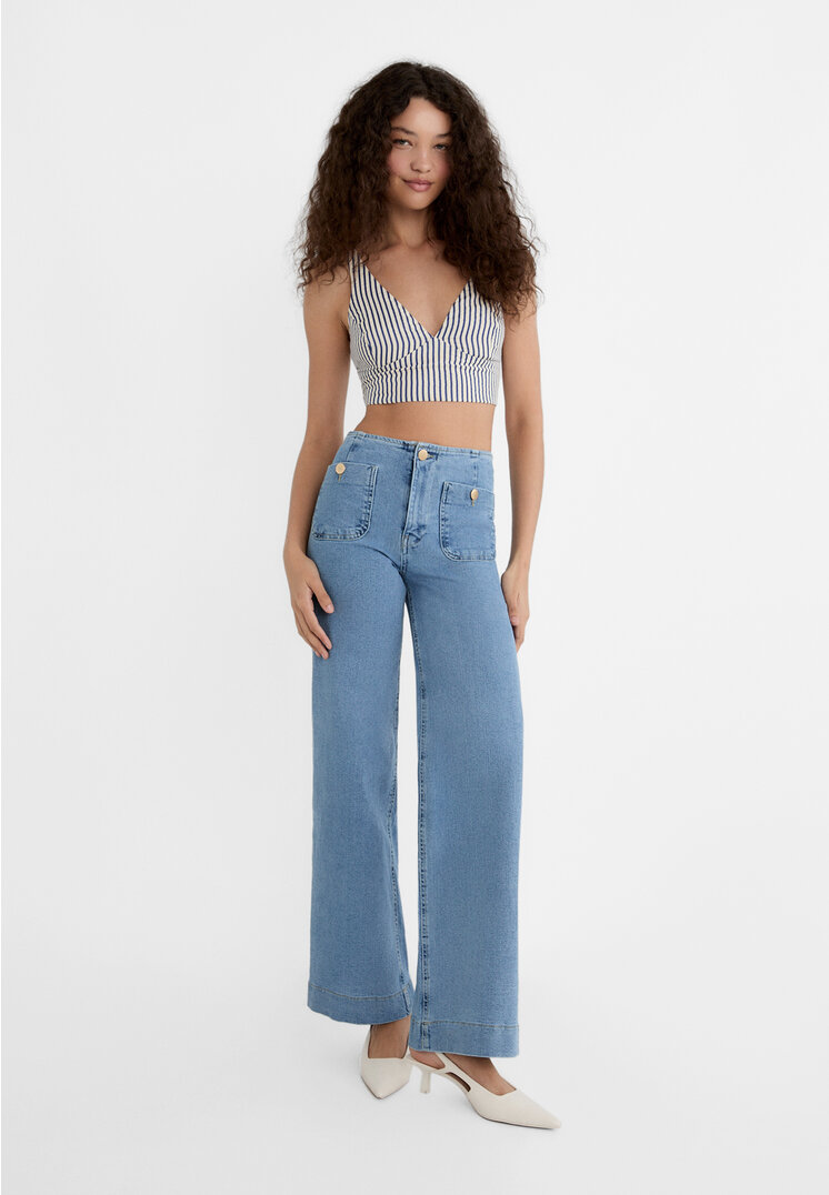 

Stradivarius Minimalistyczne jeansy z kieszeniami Niebieski denim 34
