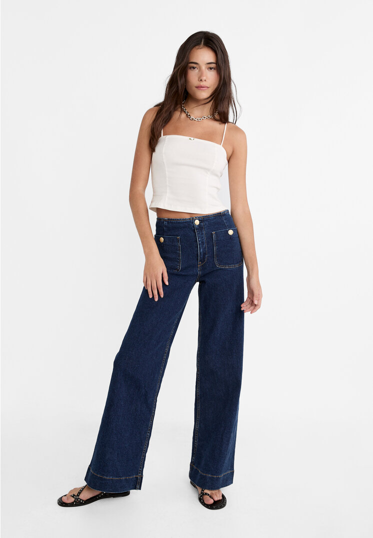 

Stradivarius Minimalistyczne jeansy z kieszeniami Niebieski denim 44