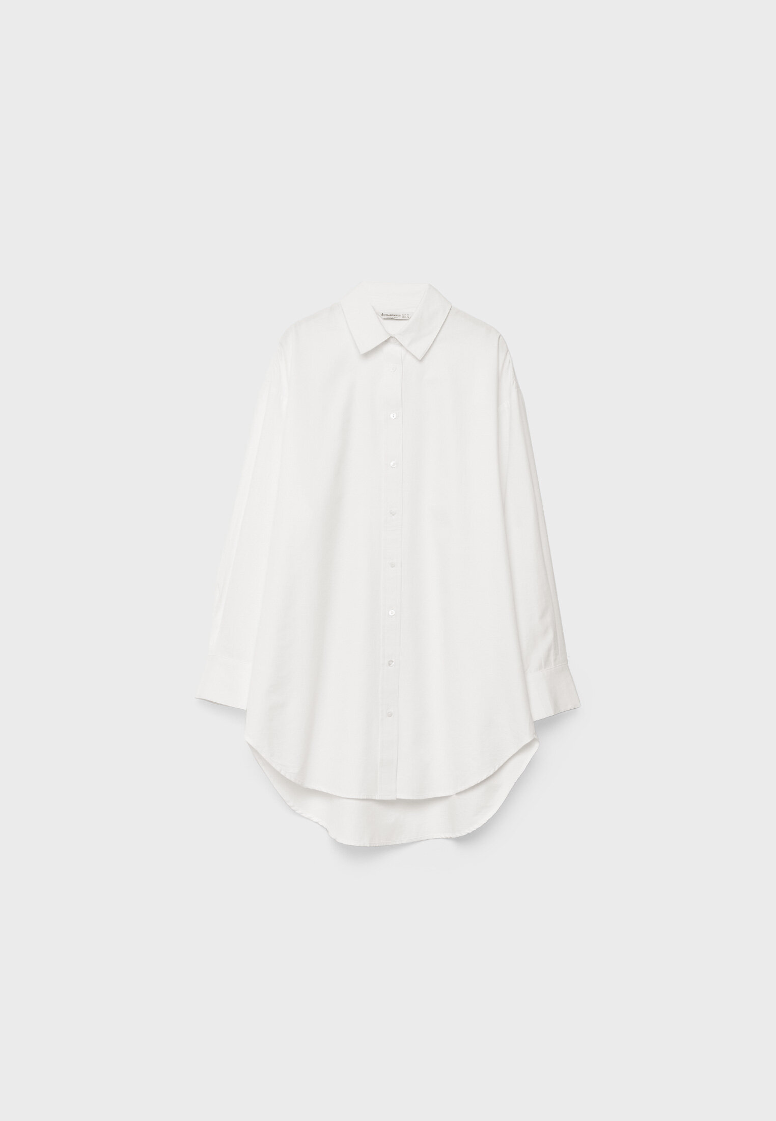 Camisa blanca larga store mujer stradivarius